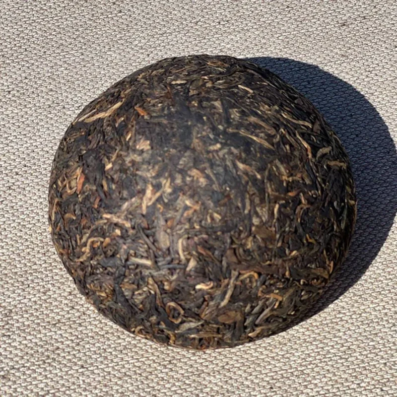 Brandinto Sheng Puer arbatos lapeliai - presuota Tuocha forma viršus