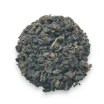 Skrudintas-Tie-Guan-Yin-sferiniai-lapeliai Skrudintas Tie Guan Yin arbata – tamsūs, sferiniai lapeliai po tradicinio kepimo ant anglies