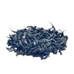 Da-Hong-Pao-Ulongas-lapeliu-tekstura Tamsiojo Ulongo Da Hong Pao stambūs lapeliai iš arti