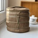 Tradicinė septynių Pu-erh arbatos blynų Tong pakuotė iš palmių lapų